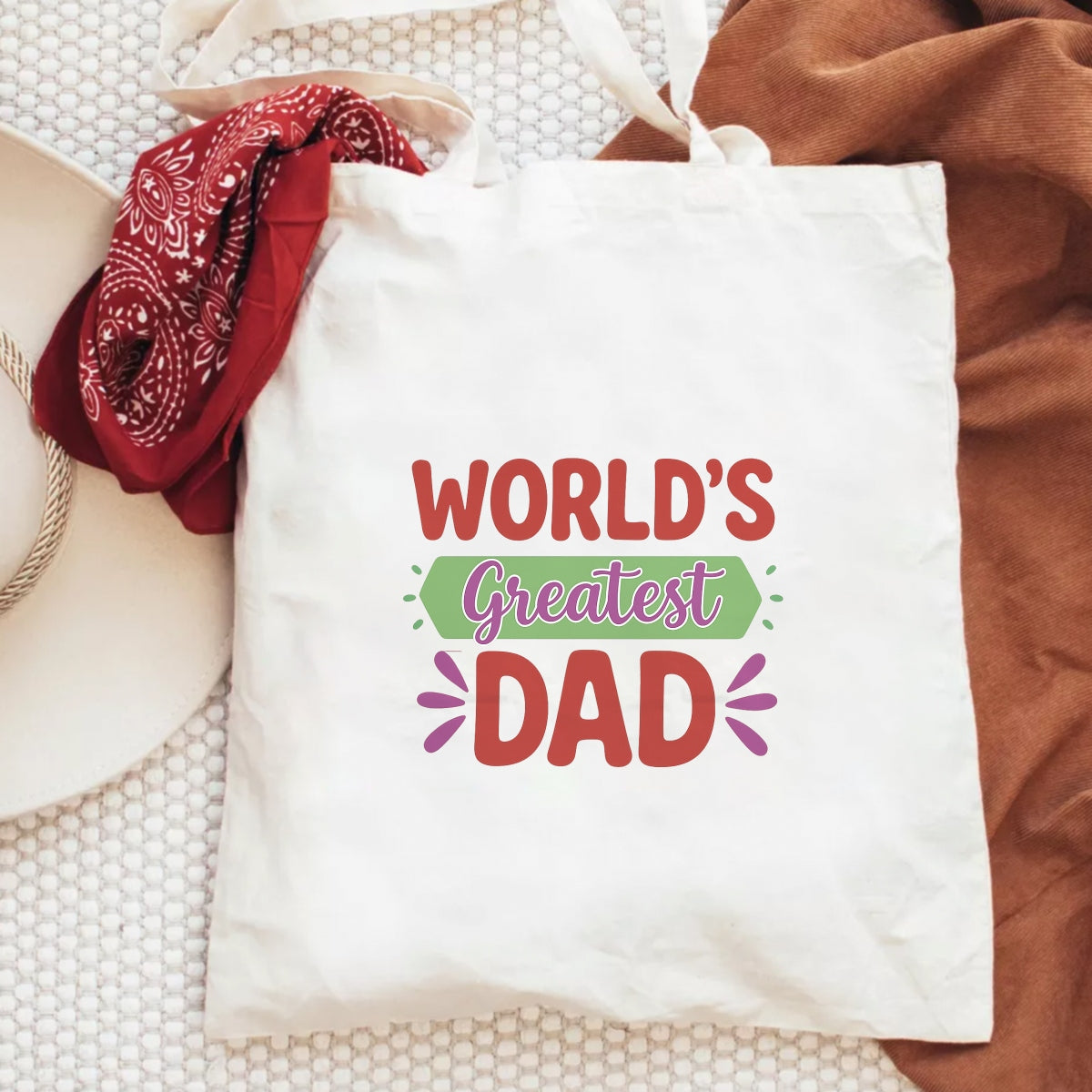 DTF Heat Transfer Iron On Sticker , "WORLD'S Greatest DAD" Vibrant Gradient Design ,Bold Block Letters with Purple Cursive "Greatest" and Starburst Accents , Father's Day Gift Sticker for T-Shirts, Hoodies, Tote Bags
