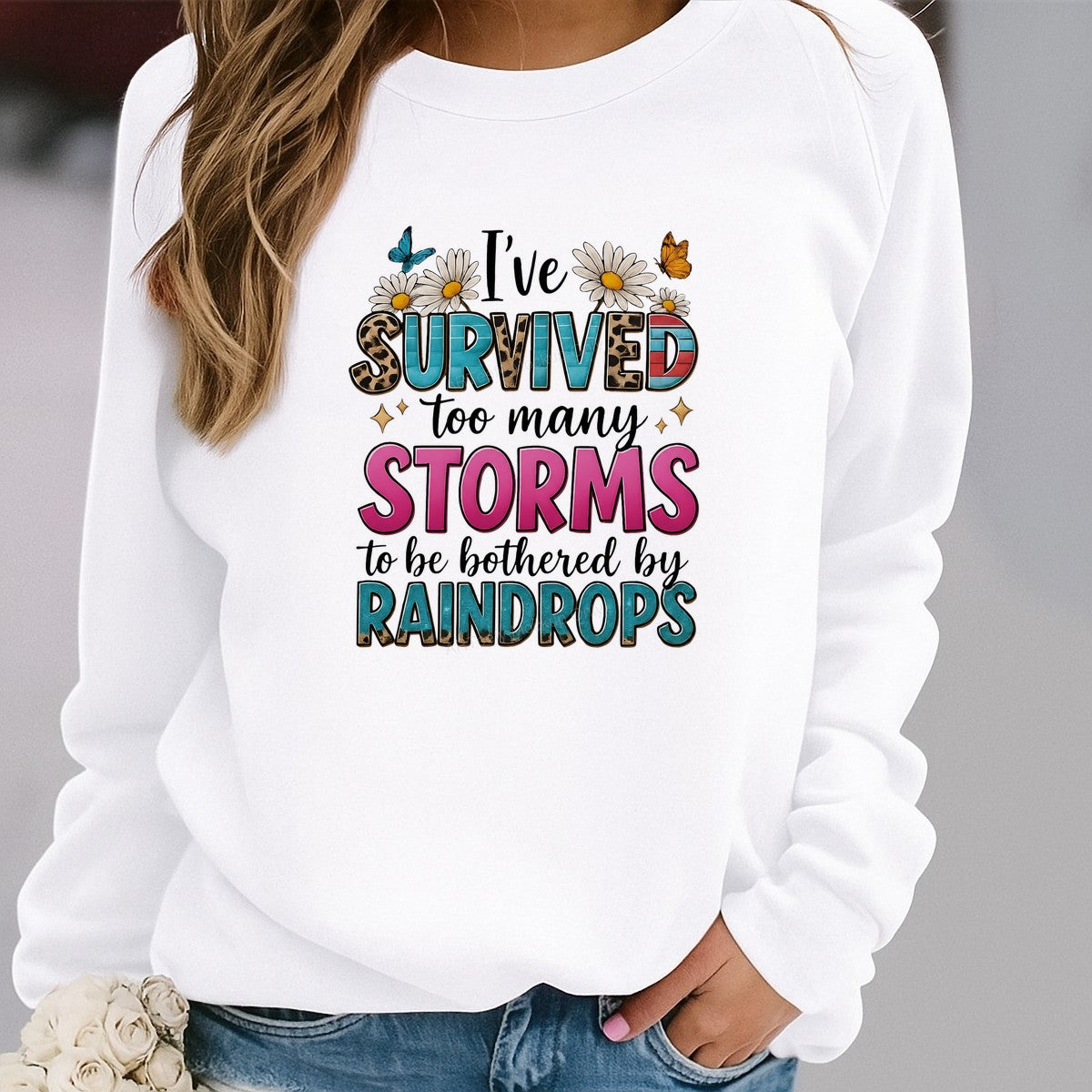 DTF Heat Transfer I’ve Survived Too Many Storms Quote with Daisies Butterflies and Retro Lettering for T Shirts Hoodies and Tote Bags - 2