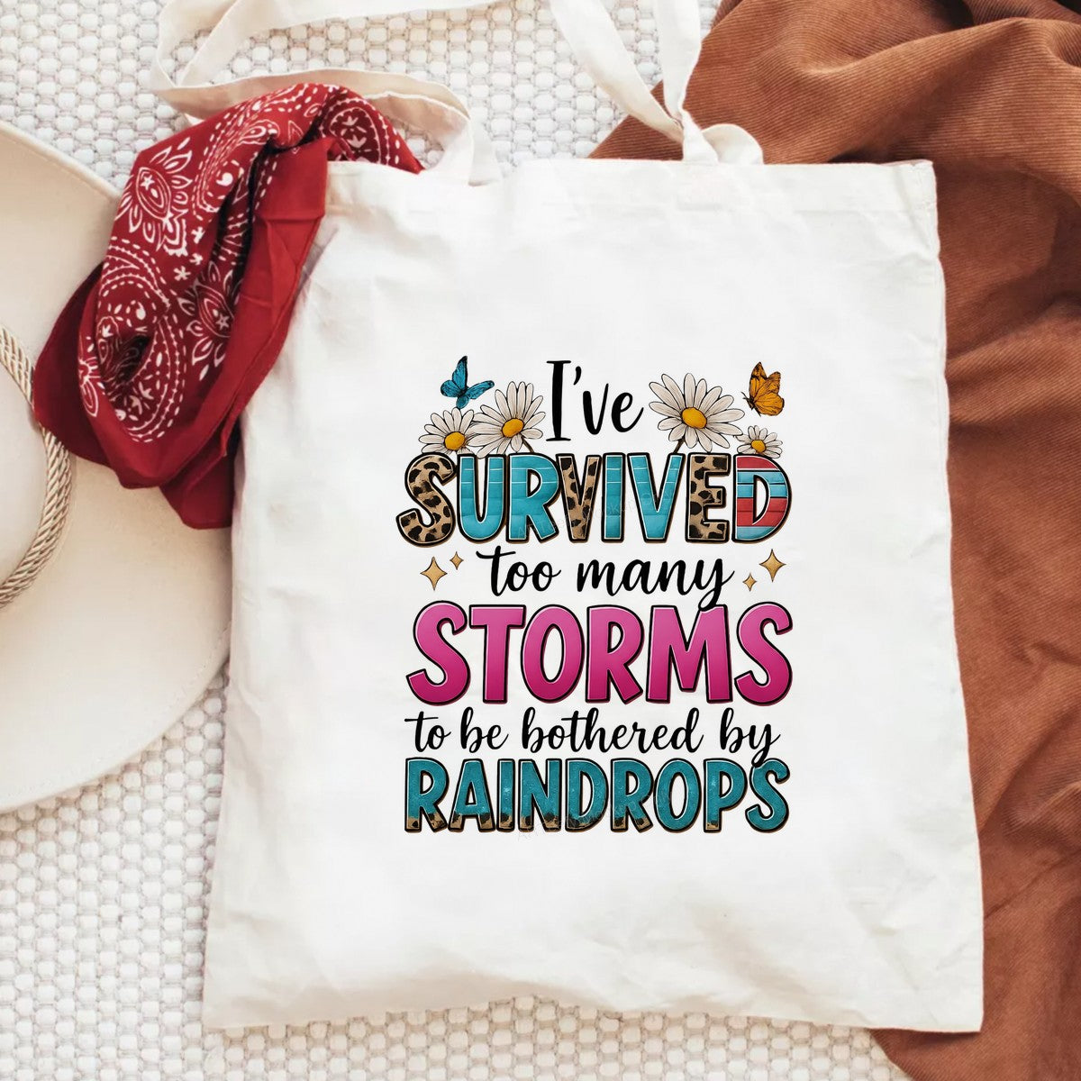DTF Heat Transfer I’ve Survived Too Many Storms Quote with Daisies Butterflies and Retro Lettering for T Shirts Hoodies and Tote Bags - 6